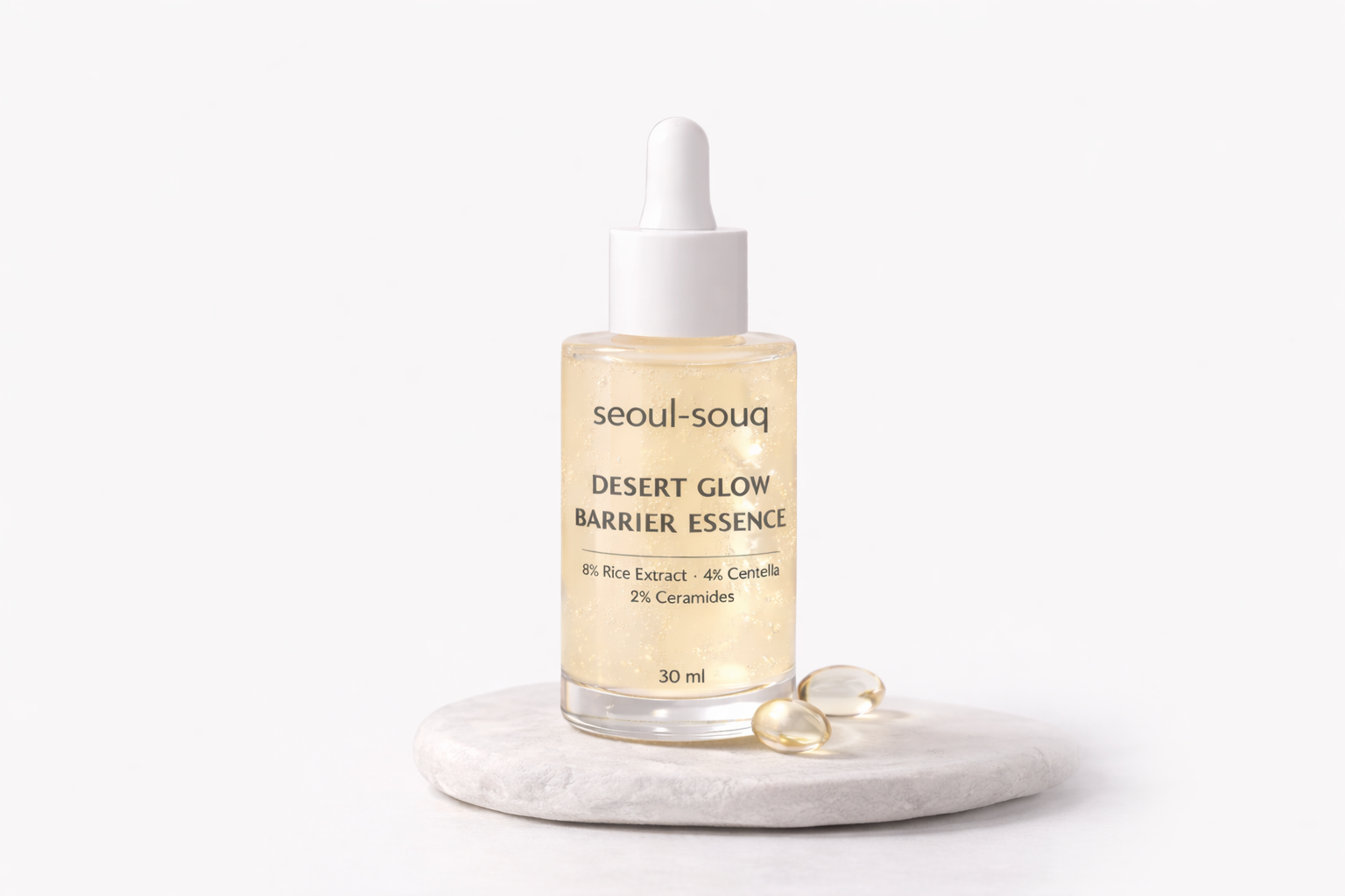 Seoul-souq Desert Glow Barrier Essence bottle with dropper on a white background